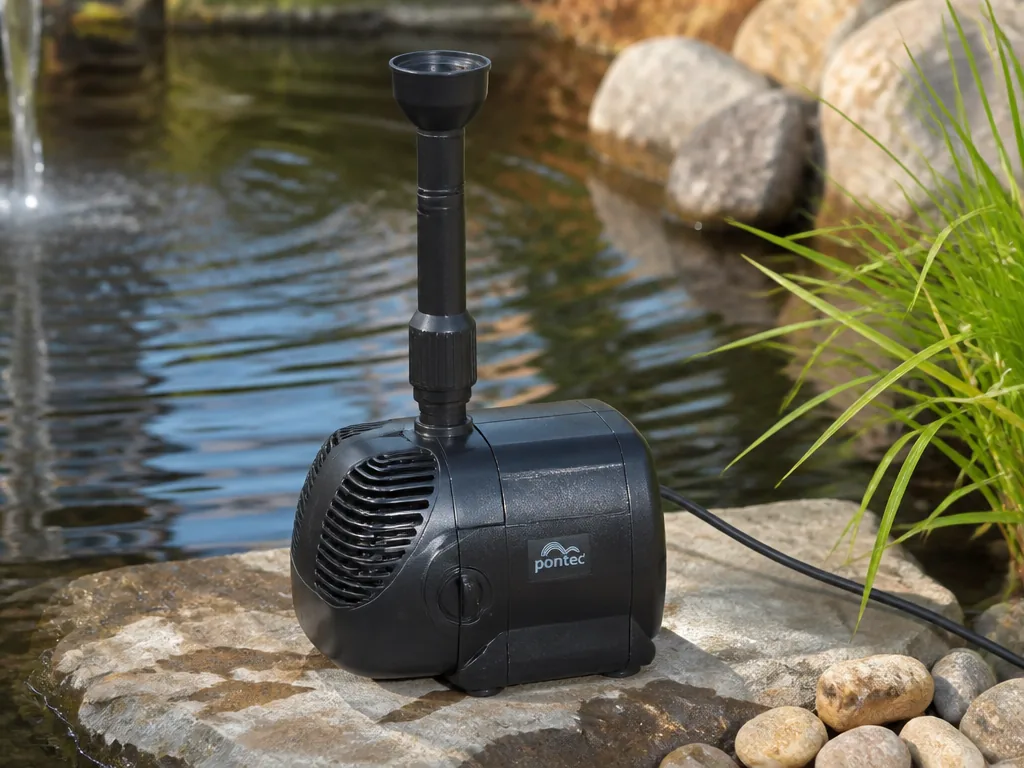 Pompe immergée dans un bassin de fontaine projetant un jet d'eau clair